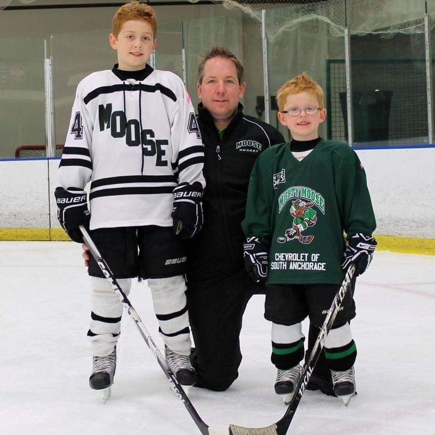 Mack Miessner coaching youth hockey players