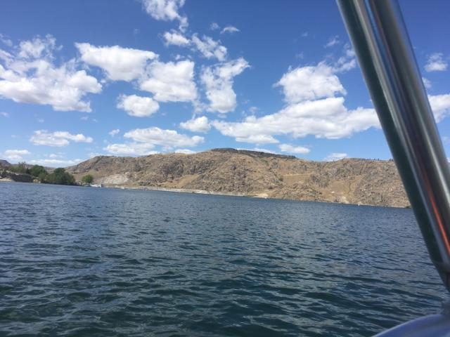 Mack Miessner on the lake by boat